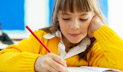 A student practicing handwriting