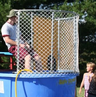 Kyle volunteering for the dunk tank at the church community BBQ!
