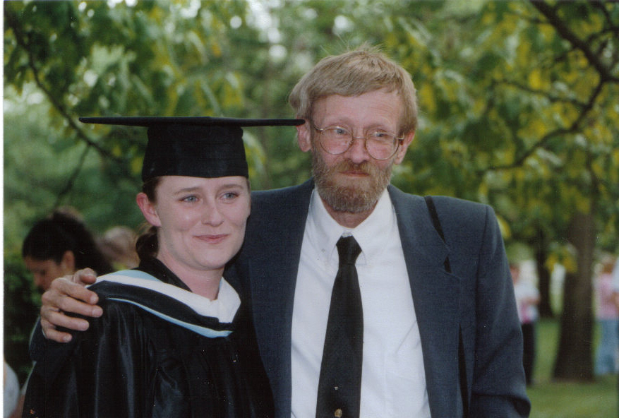 Nat's sister and father at her college graduation.