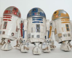 Three of Industrial Automaton's R2-series astromech droids
