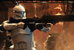 A clonetrooper blasts in to rescue the Jedi on Geonosis