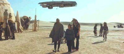 Qui-Gon, Padm�, Jar Jar and R2-D2 enter Mos Espa