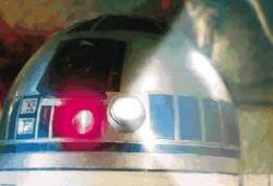 R2-D2 uses his holoprojector in Jabba's palace