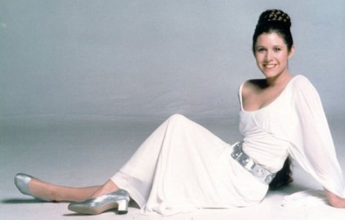 Princess Leia in her formal attire, striking a less-than formal pose