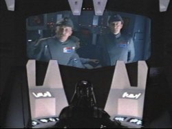 Darth Vader views the bridge of the Executor from his chamber