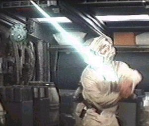 Luke Skywalker practices against a training remote on the Millennium Falcon