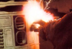 A Jawa welds a restraining bolt to R2-D2
