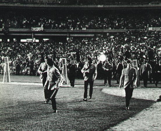 The Beatles running out to the bandstand at Shea, August 15,1965.