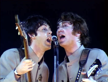 Paul and John singing at Shea, August 15,1965.