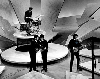 The Beatles performing 1964.
