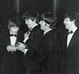This is what the Fab Four would look like attending the Holly Hop.