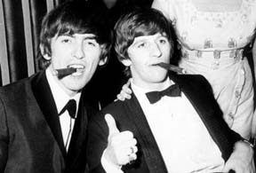 Relaxing with a cigar, George and Ringo 1965.