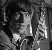 George playing the guitar in the song I Should Have Known Better in the movie, A Hard Day's Night 1964.