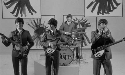 The Beatles singing the song I Should Have Known Better in the movie, A Hard Day's Night 1964.