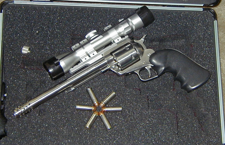 Ruger Super Blackhawk w/Mag-na-port muzzle brake, Bushnell 1.5-4.5x Scope and Hogue monogrip; .44 Magnum