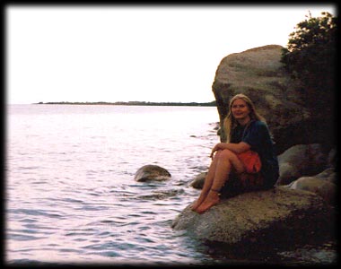 Background is cape where Blue Issyk Kul sanatorium is located