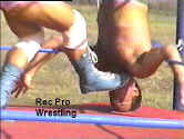 The stomp becomes a choke with his boot.