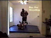 Larry continues his destructon of Trey with a leglock.