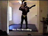 Larry sets Trey up a suplex.