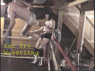 Jake dropkicks the Ringmaster