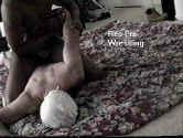 Barefoot Boy's face in the mat while Barr holds his arm.