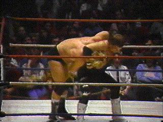 Lawler takes the advantage with a headlock