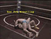 Barefoot boy attempts a pin.