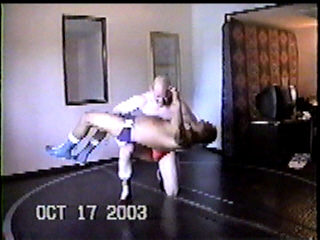 J.P. uses a crushing backbreaker