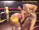 Lionmane's elbow is attacked by his larger opponent.