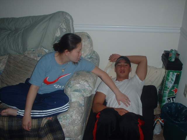 after the wedding.. awww.. they got my baby all messed up.. looky me.. takin kare of him..4-12-03