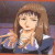 Une holding her glasses