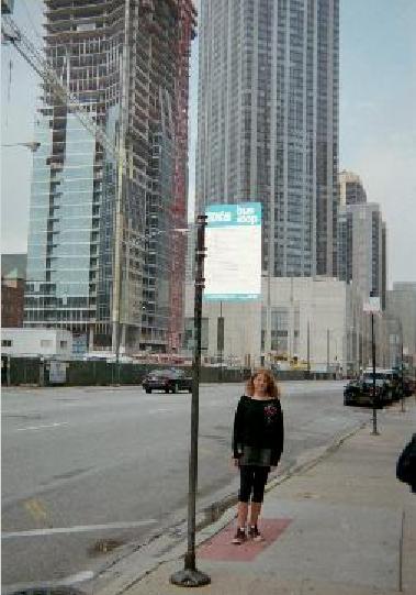 KRICKET NEAR TALL BUILDINGS