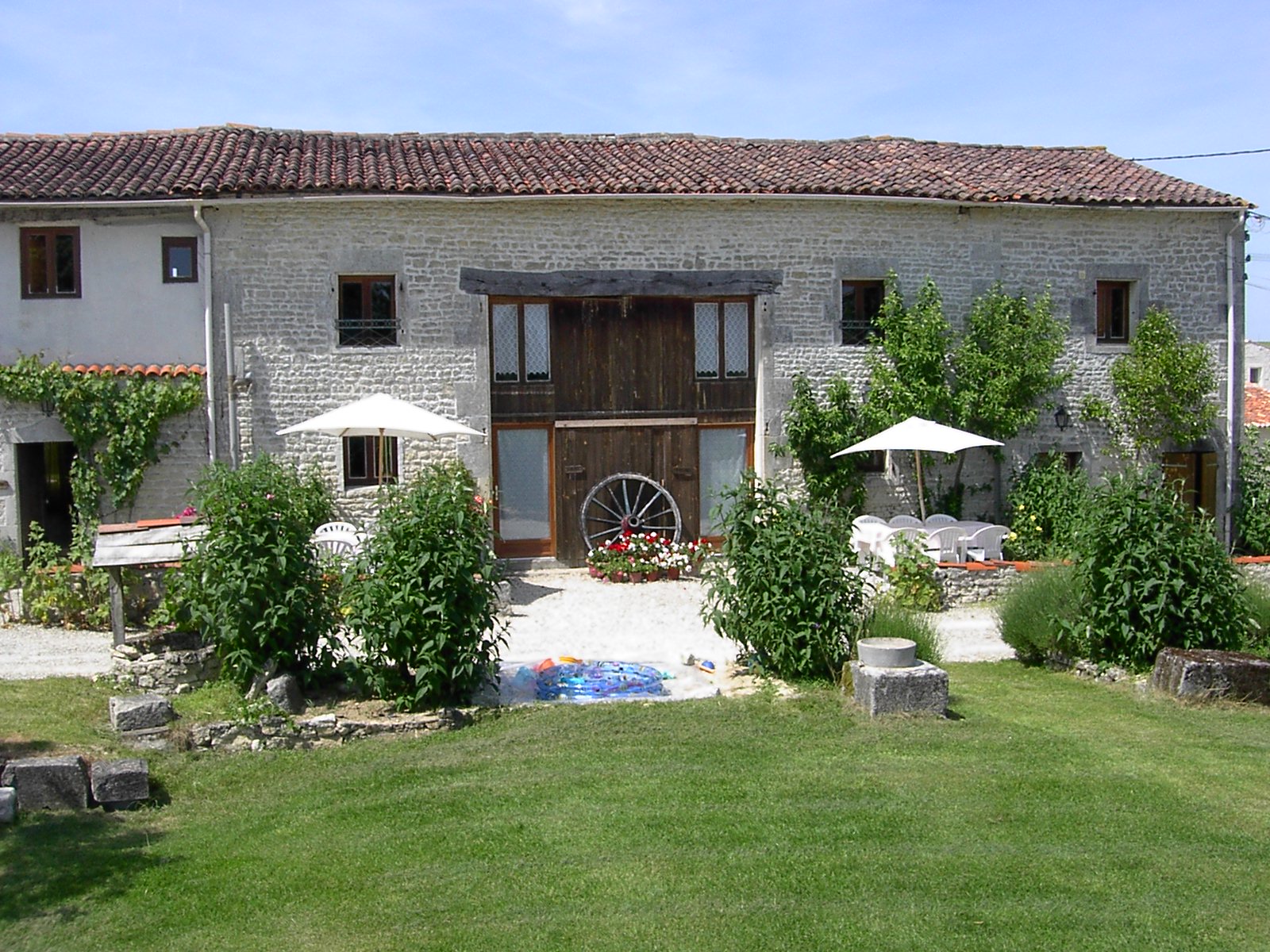 Cottages from garden at La Grange du Moulin