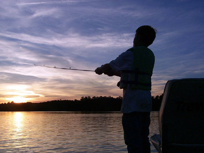 fishing at sunset