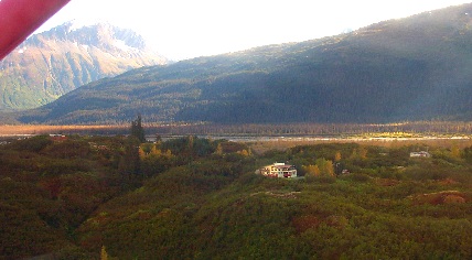 An aerial view of the house and surrounding countryside