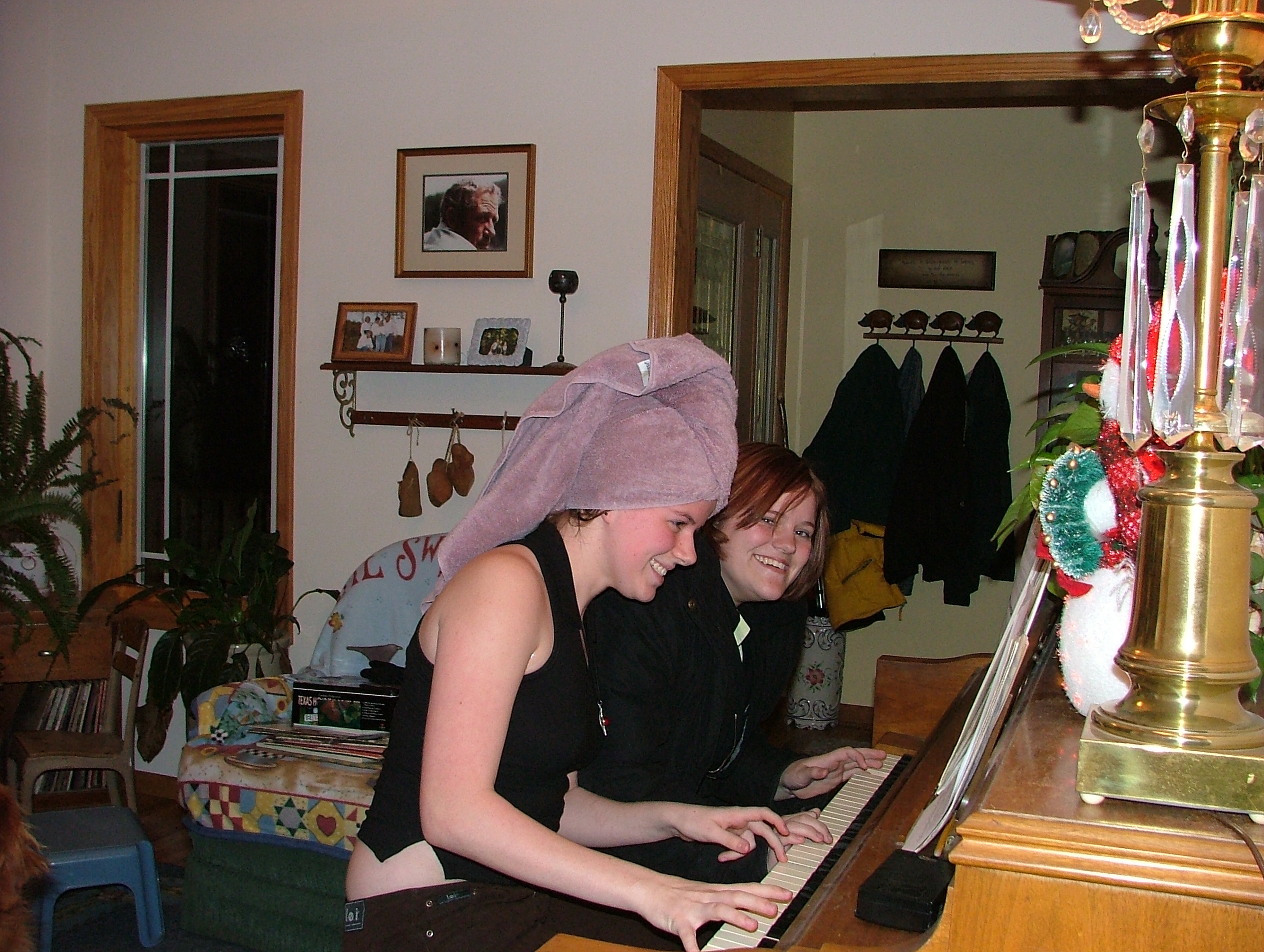 Angela and I playing the piano