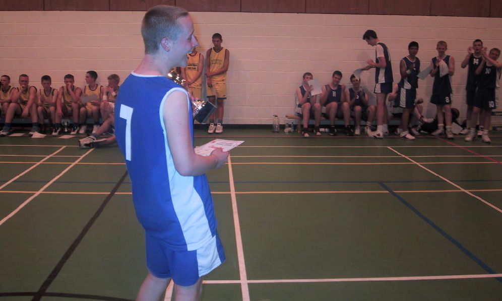 Clitheroe captain receiving trophy
