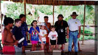 Hernan and the kids giving away the donations for the tribe