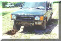 Is that the right front tire floating in the air? Paul flexing a Series II Disco's suspension. ETC is fantastic!