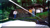 Ivan, Toti and Juan Carlos in front of the Forest Reserve entrance, starting the 6 hour trek