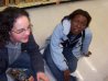 Sara & Amber...sitting on the floor at wal-mart