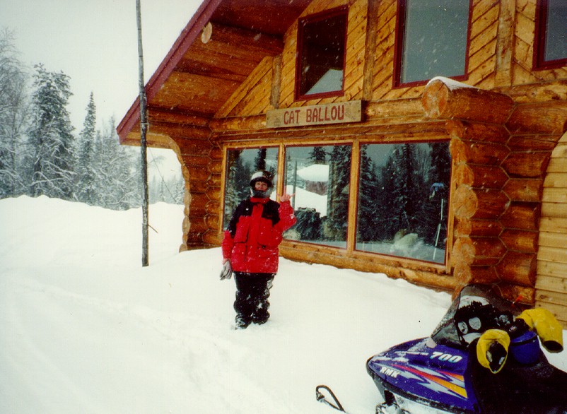 Who is this guy? Get away from our house! But leave your snowmobile!