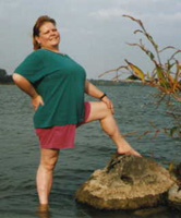 Standing by the water.