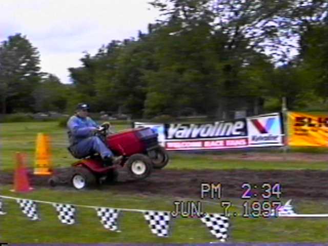 CHUCK HEINEMAN DOING A WHEELIE ON HOMER II