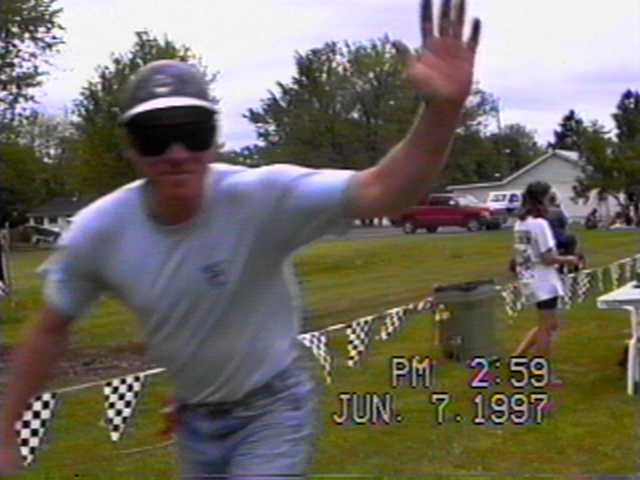 TIM WAVING HI TO HIS MOM