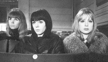 Astrid Kircherr, Maureen Starr and Pattie watching a private exhibition of AHDN