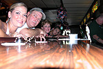 Lauren Dad Sally and Grant getting a drink at the bar