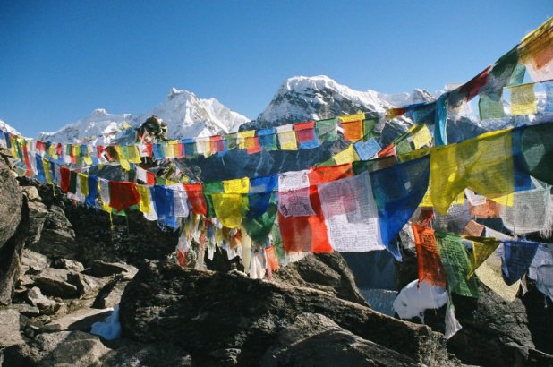 Prayer Flags flutter on Gokyo Ri's summit