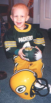 Logan in Football Uniform