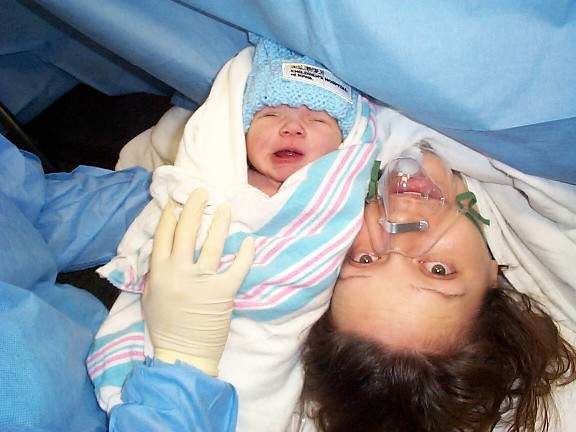 Ethan just cleaned and dressed in the O.R. shown to Mommy for the first time.